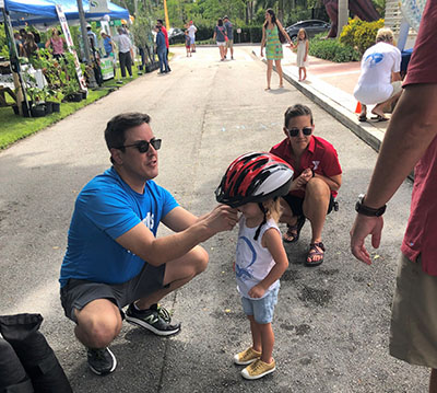 Vision Zero event, bike helmet fitting, August 20, 2019, South Florida Science Center & Aquarium