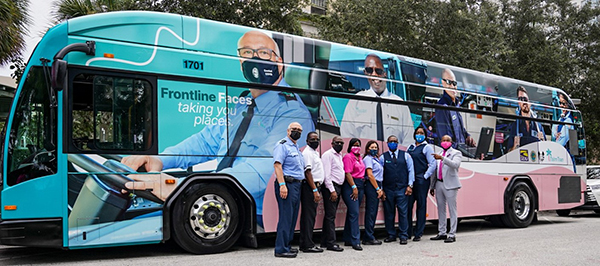 Palm Tran's "Frontline Faces Taking You Places" Campaign Bus 